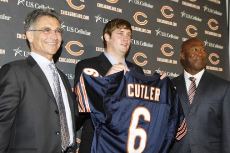 Jay Cutler Holding his New Bears Jersey